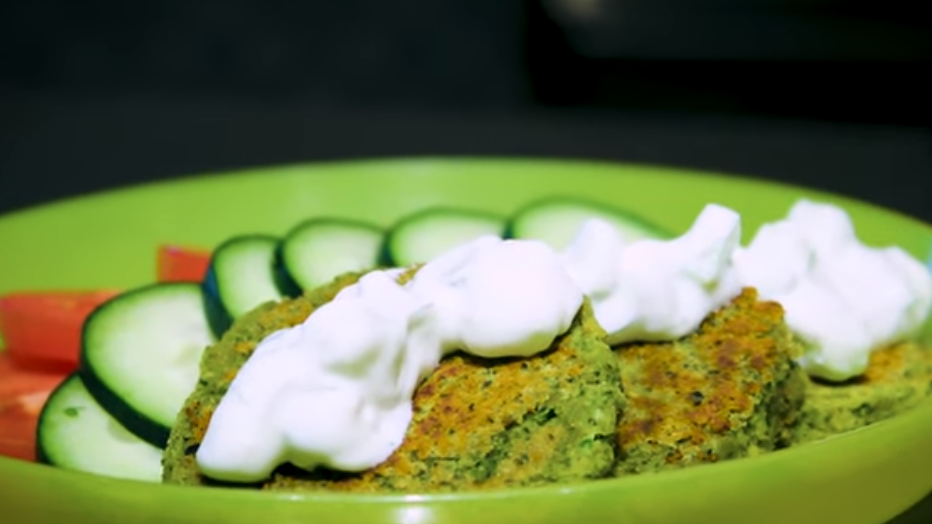 falafel and taziki served with sliced veggies