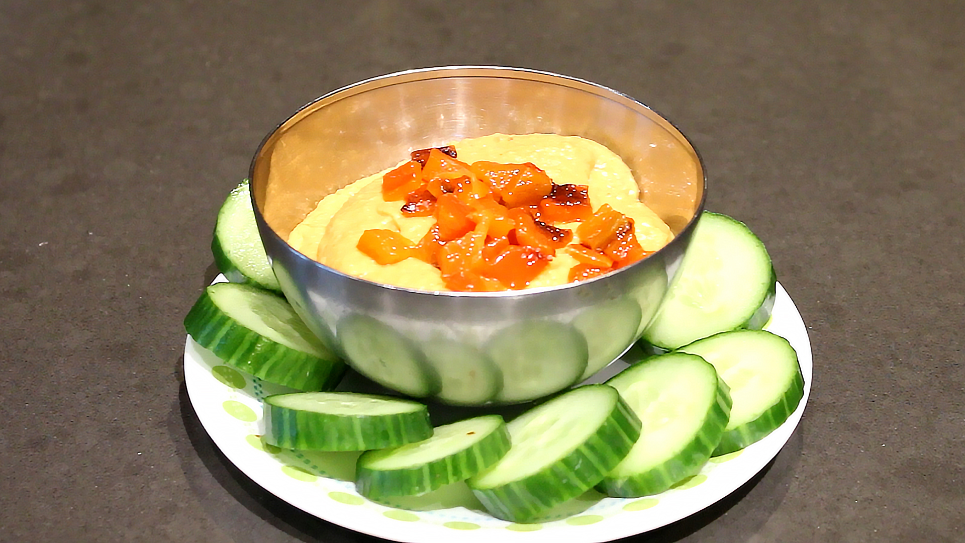 roasted red pepper hummus served with cucumber slices